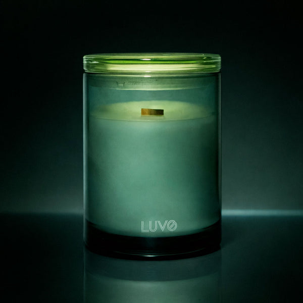 Pear & Magnolia 270g wooden wick candle in a green glass jar with lid, dark background