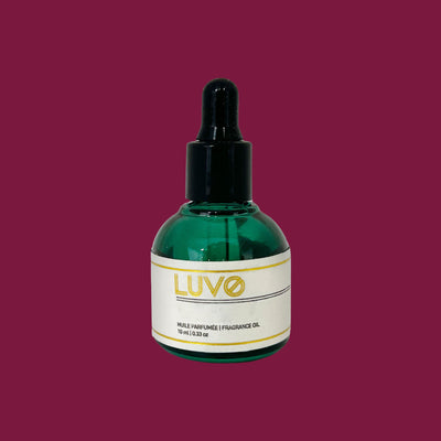 Bing Cherry & Leather 10ml fragrance oil in a green glass dropper bottle on a burgundy background