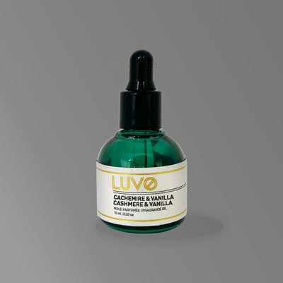 Cashmere & Vanilla 10ml fragrance oil in a green glass dropper bottle on a grey background