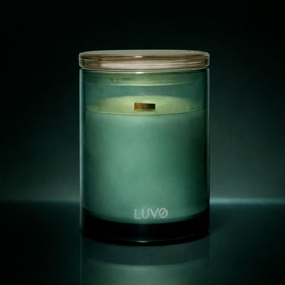 Cashmere & Vanilla 270g wooden wick candle in a green glass jar, dark background