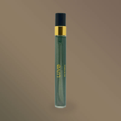 Cedarwood & Labdanum eau de parfum 10ml slim travel spray on a taupe background