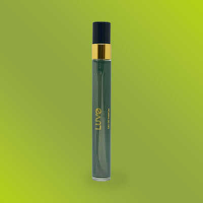 Pear & Magnolia eau de parfum 10ml slim travel spray on a lime green background