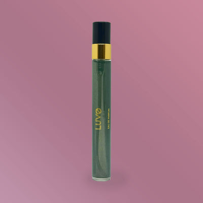 Sweet Brier Rose & Cardamom eau de parfum 10ml slim travel spray on a pink background